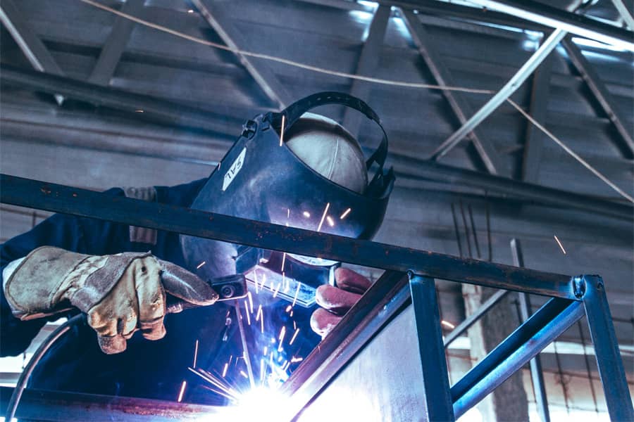 welder working on metal